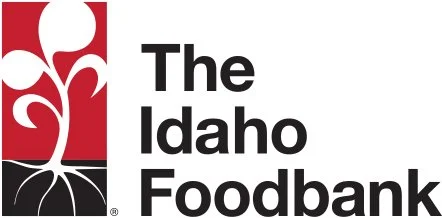Logo of The Idaho Foodbank with a stylized red and white tree design and bold black text