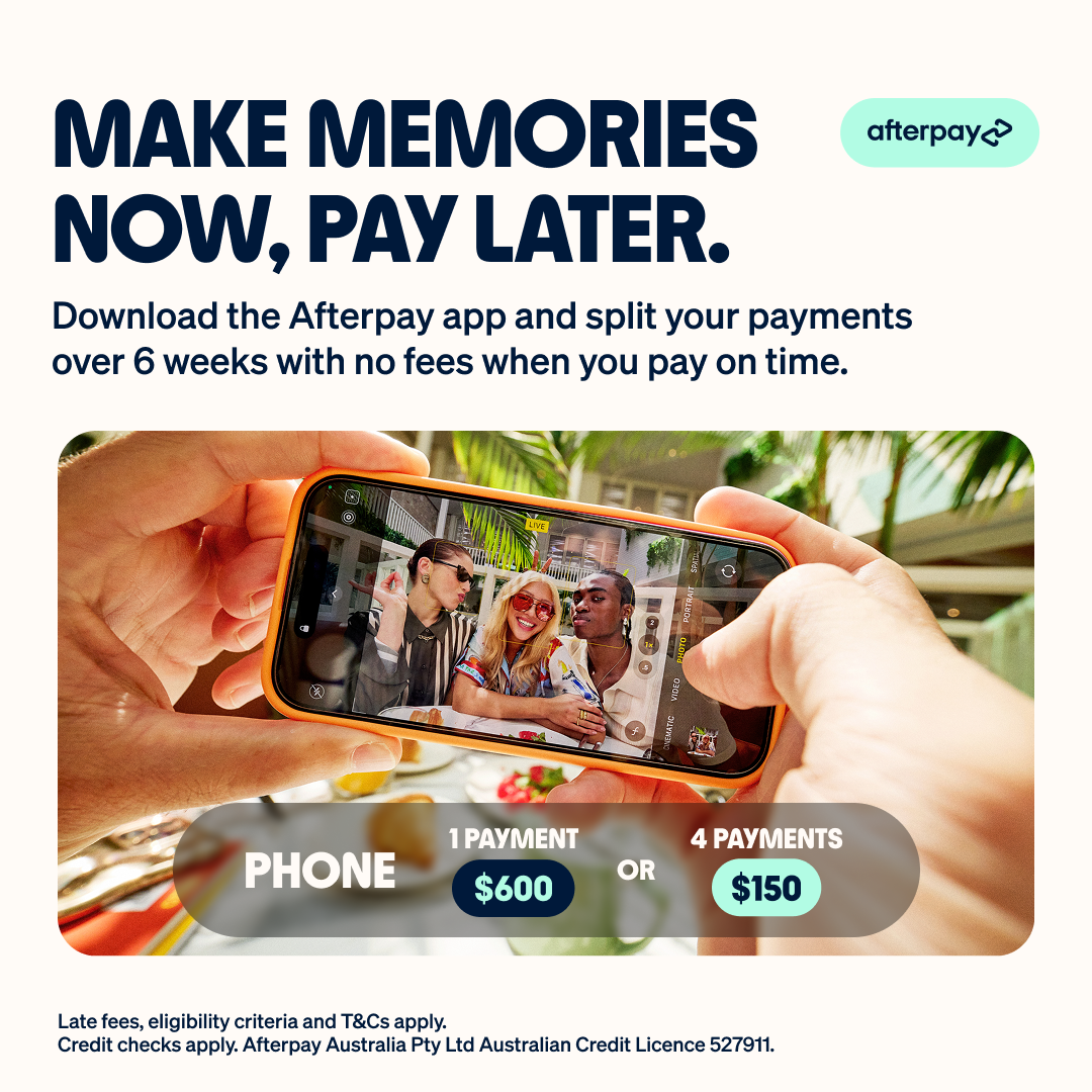Advertisement promoting Afterpay, showing a person taking a photo of three women with a smartphone at a cafe. Text overlay states 'Make Memories Now, Pay Later' with payment options of one payment of $600 or four payments of $150.