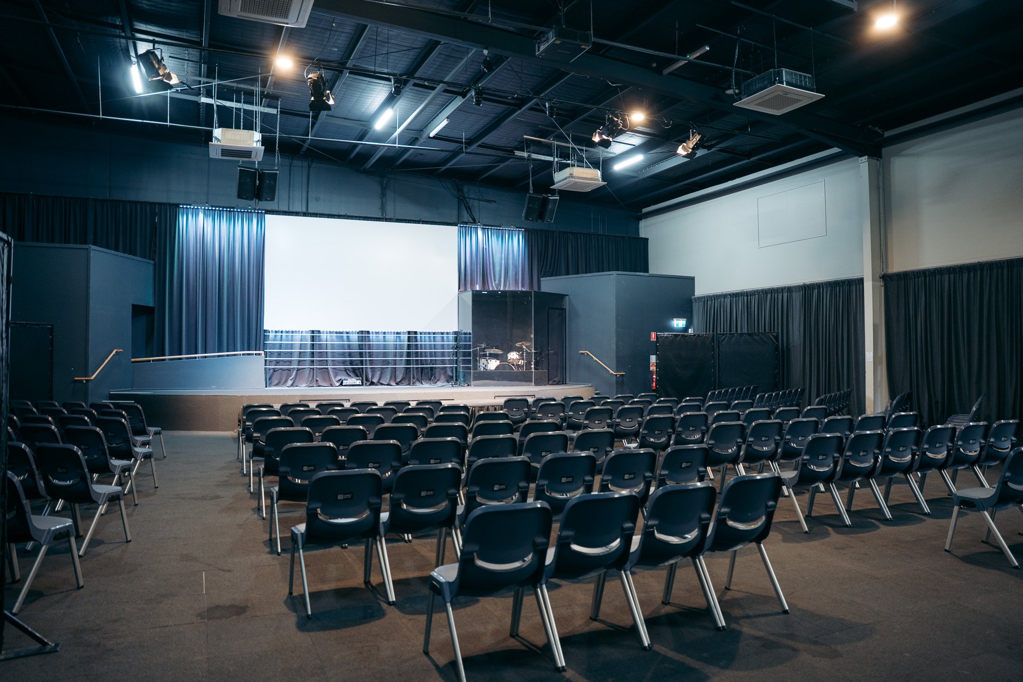 Caloundra event space for hire with auditorium seating, stage, projection screen and AV facilities on the Sunshine Coast.