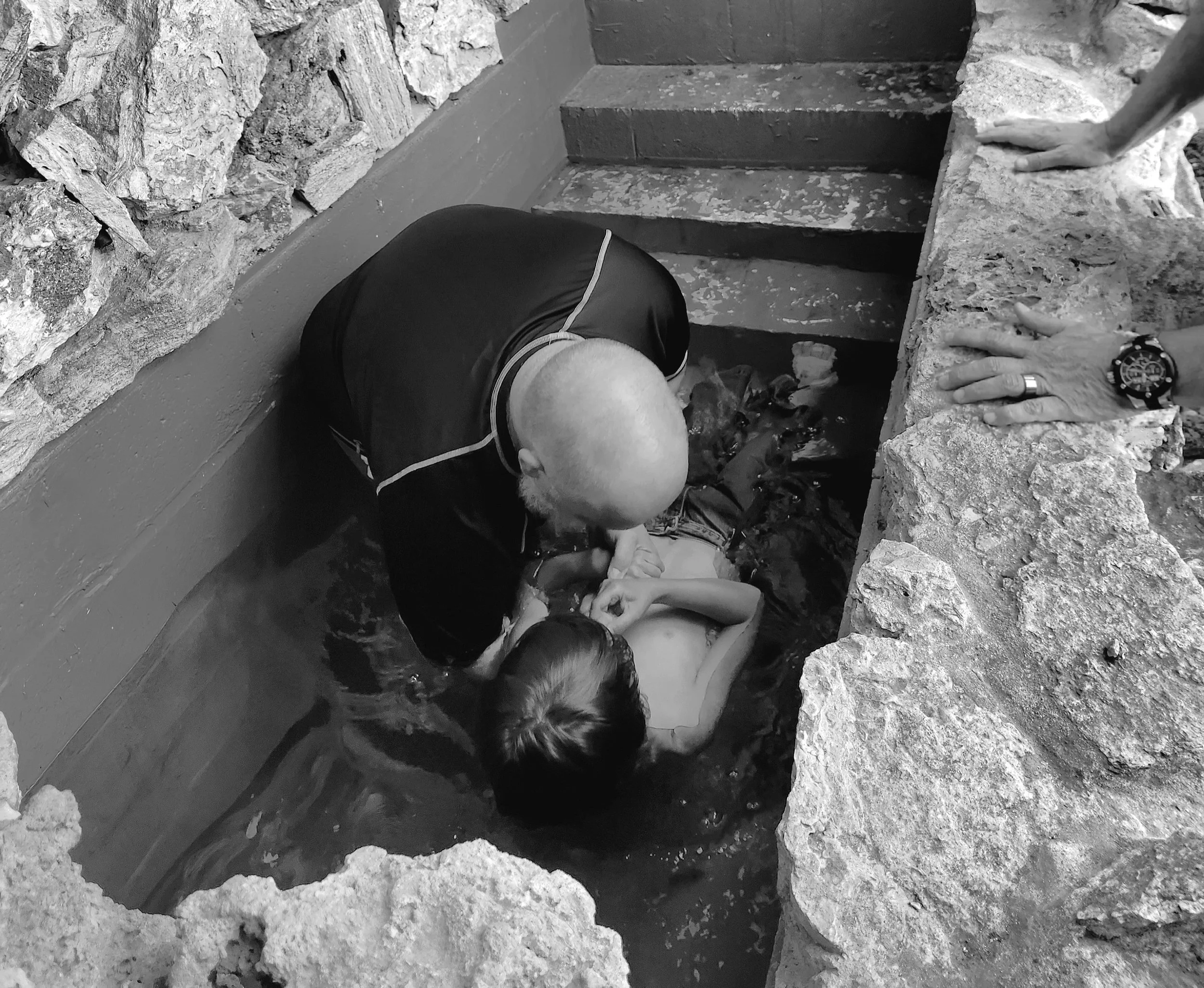 CHURCH ELDER BAPTISING A PERSON