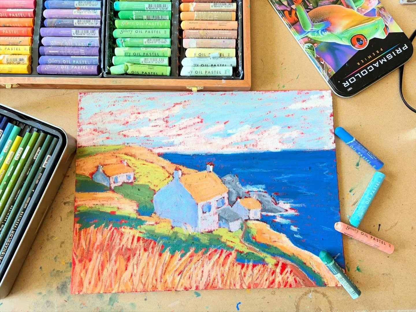 Trying out some landscapes Stay tuned! 
Village on the Shore
Oil Pastel on Canvas Board
9x12