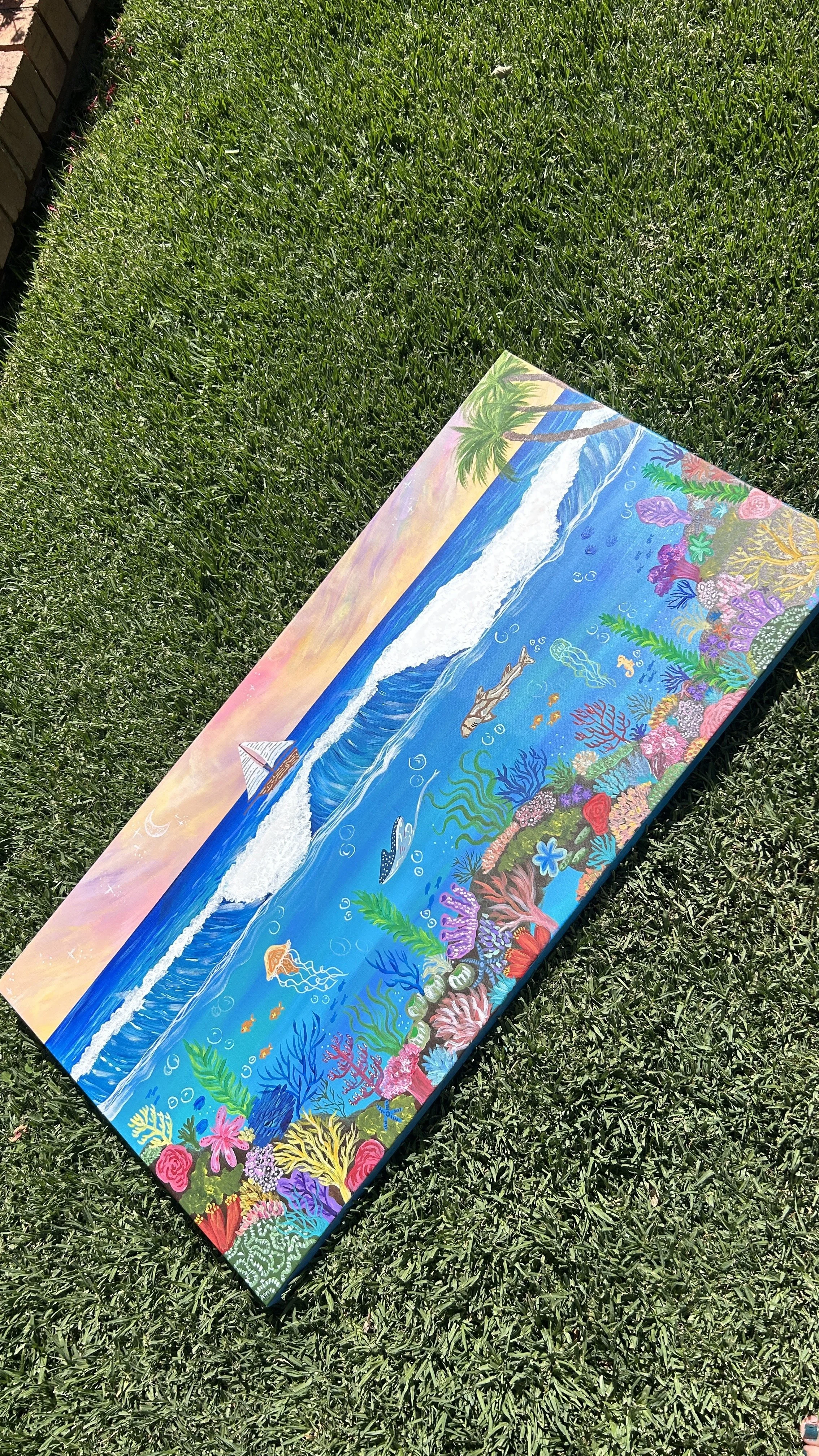 Colorful painting of an underwater coral reef scene with sea animals and a beach with palm trees in the background.