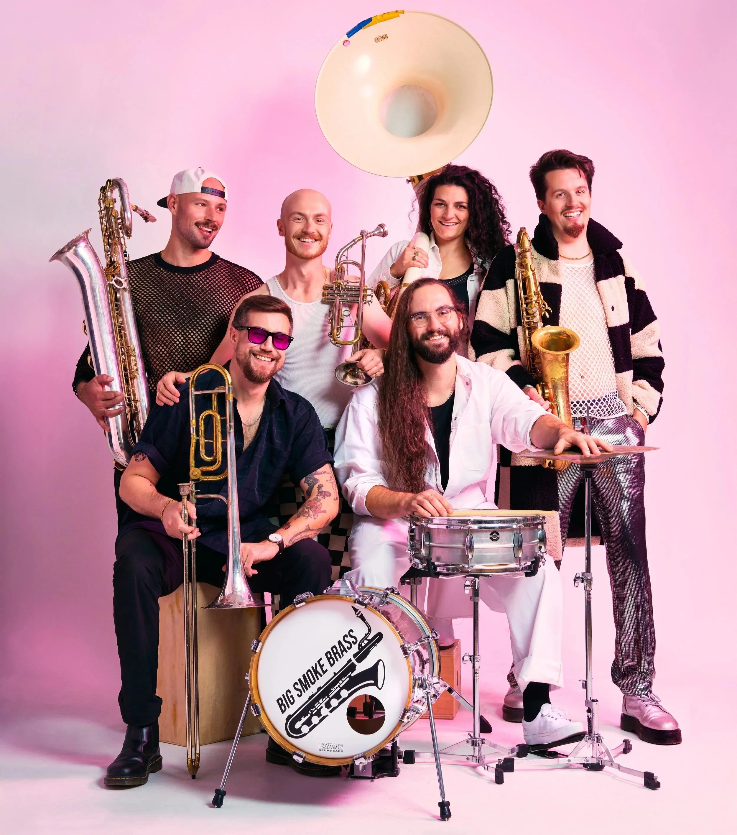 A studio photo of the band in their show attire. Flashy, edgy, yet fun.