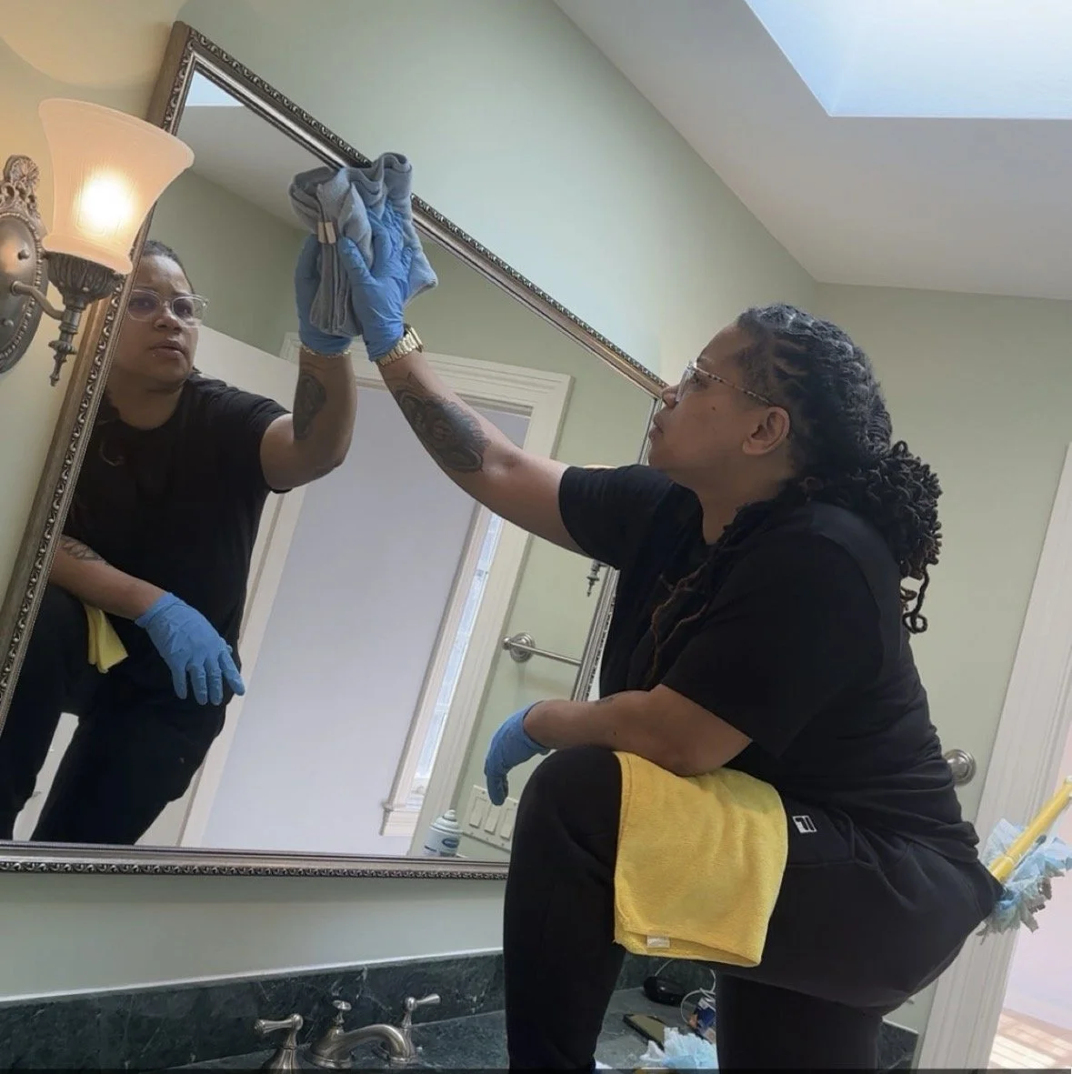 Magnificent Topnotch Cleaning team performing detailed bathroom cleaning.