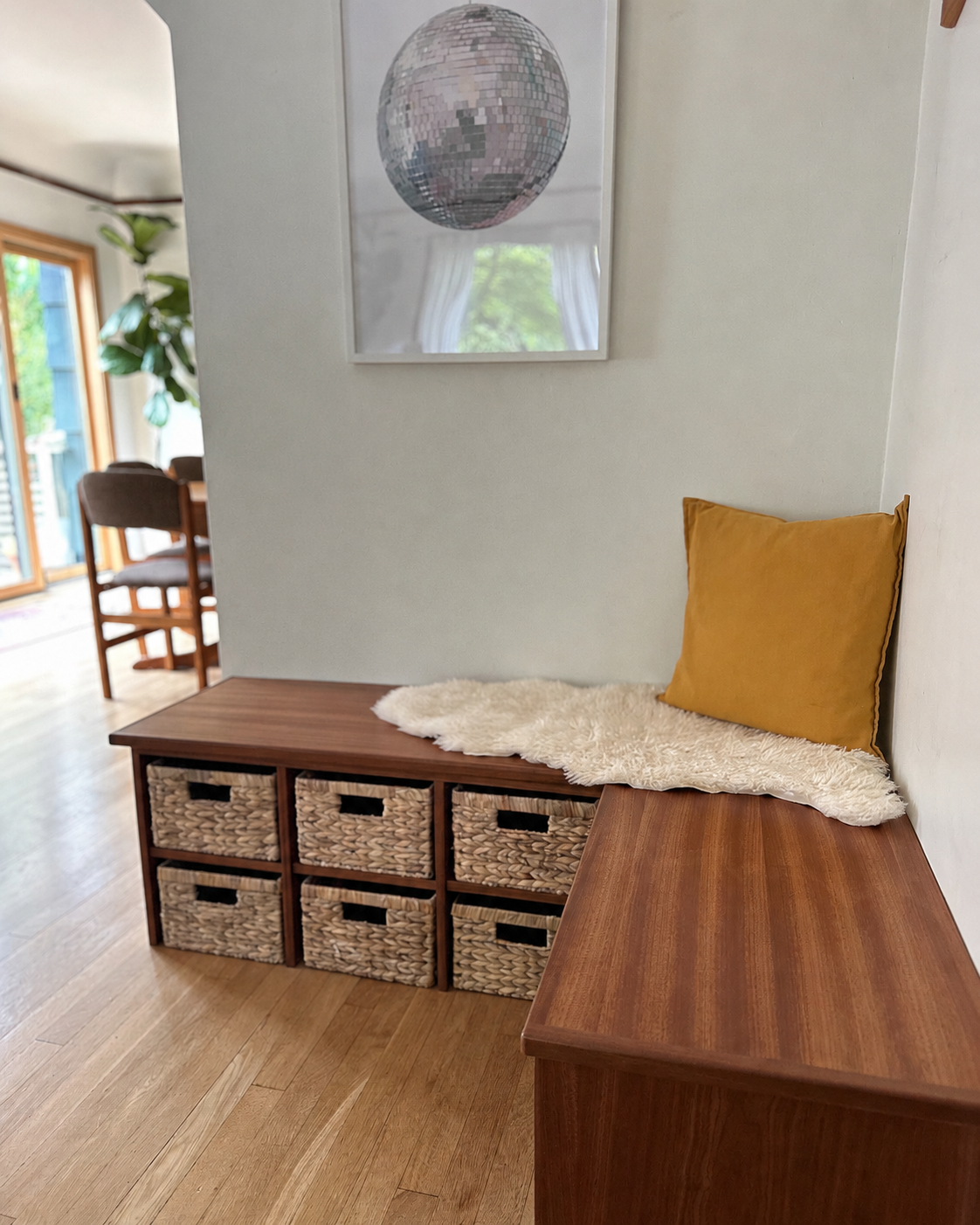 custom-sapele-corner-entryway-bench-basket-storage-detail-portland.png