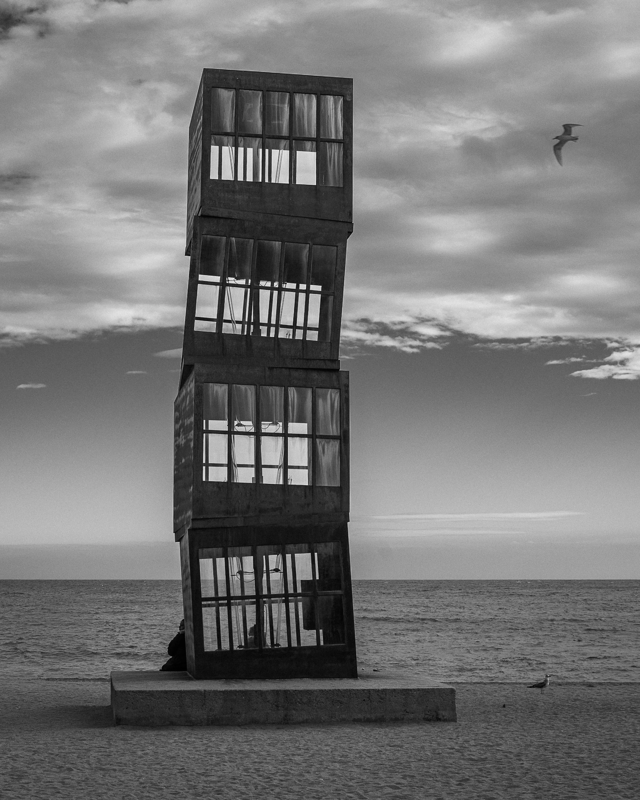A solitary structure facing wind and sea