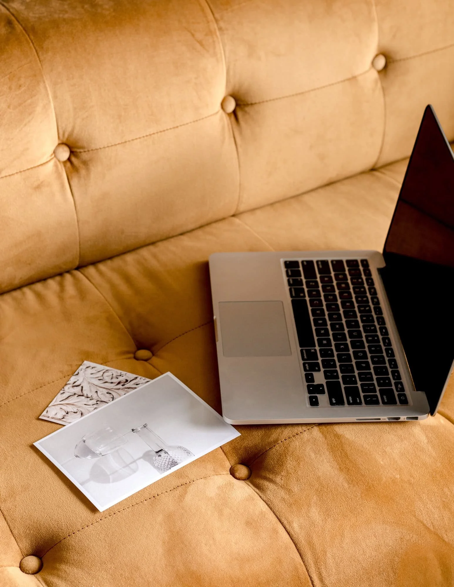 Laptop on a yellow couch