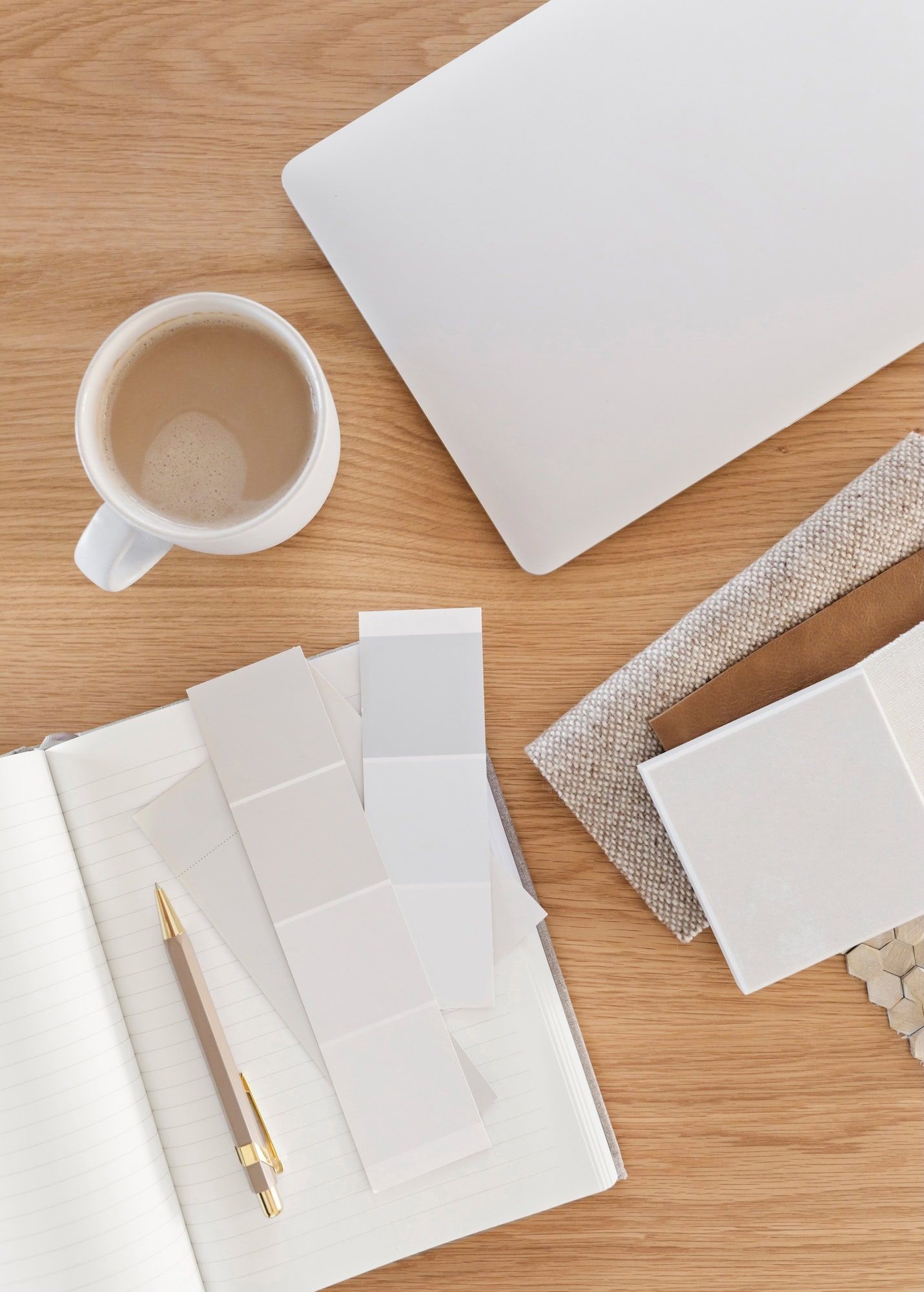 Coffee and paint chips on a wooden desk
