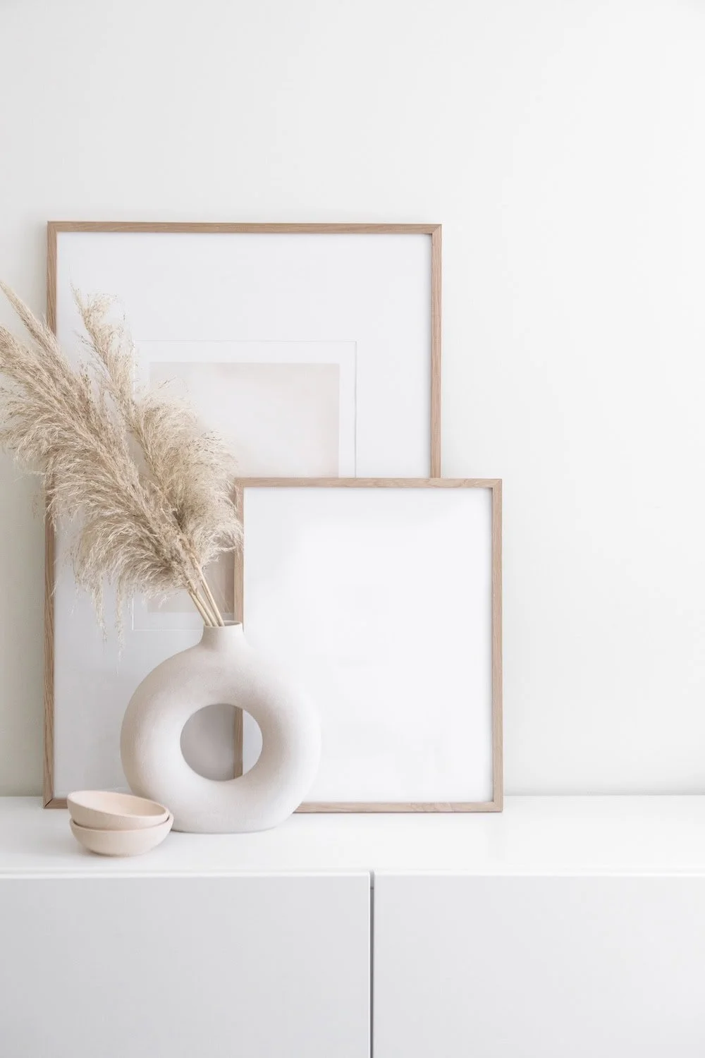White picture frames with vase