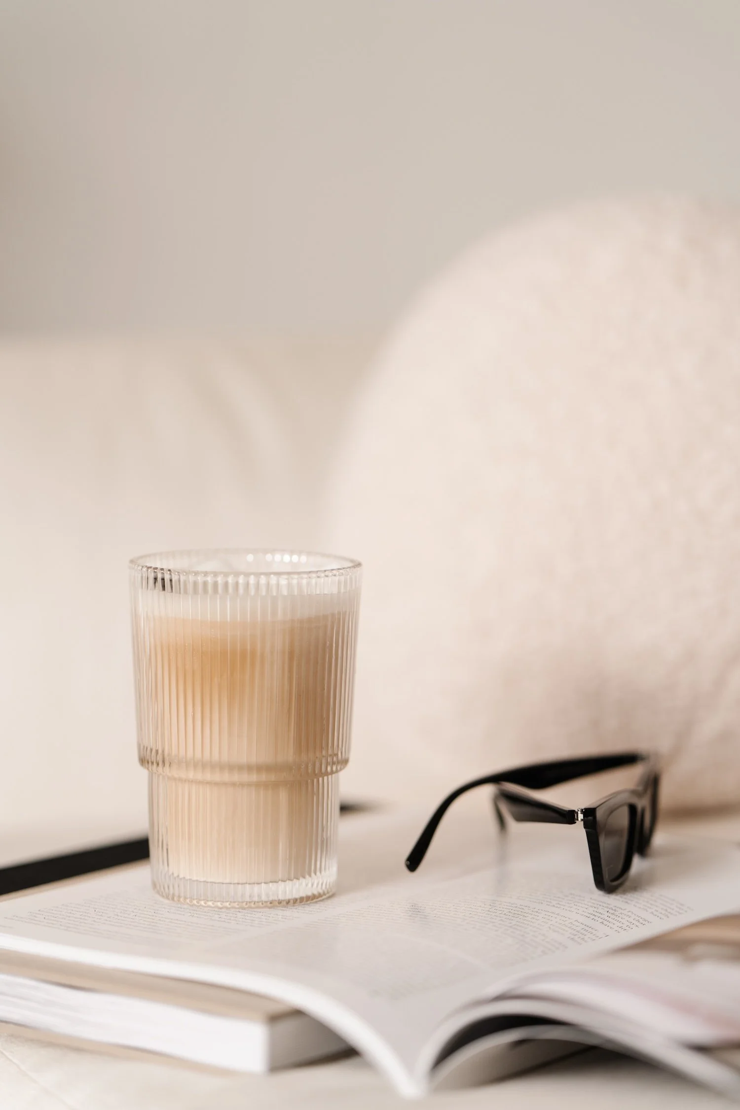 Coffee, sunglasses, and books