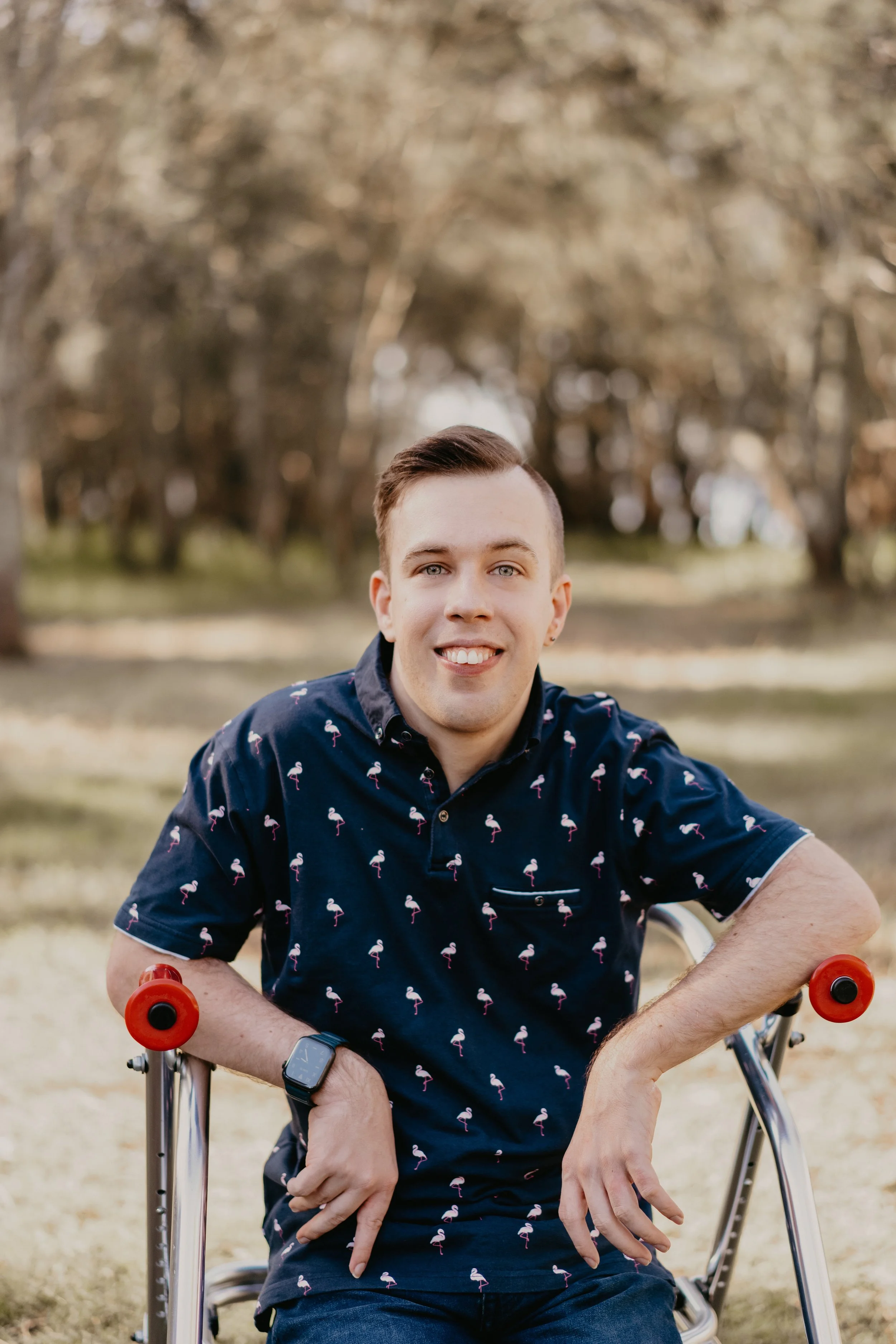 Aaron Millerand, social worker and founder of Breaking Limits, smiling outdoors using a walking frame