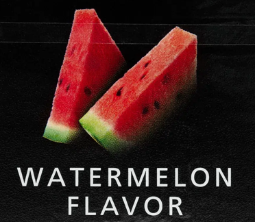 Two slices of watermelon with red flesh, black seeds, and green rind on a black background with the text "Watermelon Flavor" underneath.