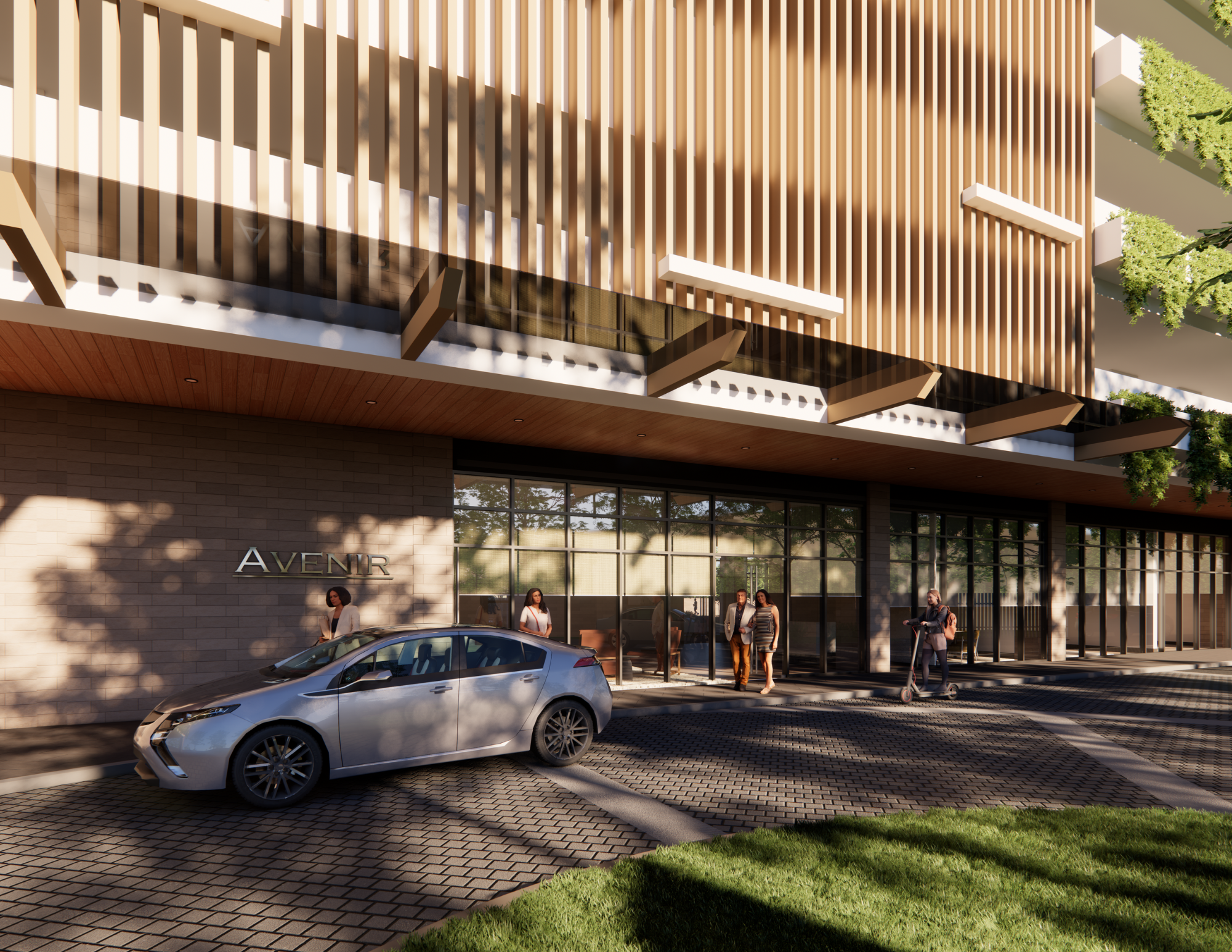 Modern apartment building with a car parked in front, people walking and standing outside, with the sign 'Avenir' on the brick wall, glass entrance doors, and architectural features including wooden slats and greenery.