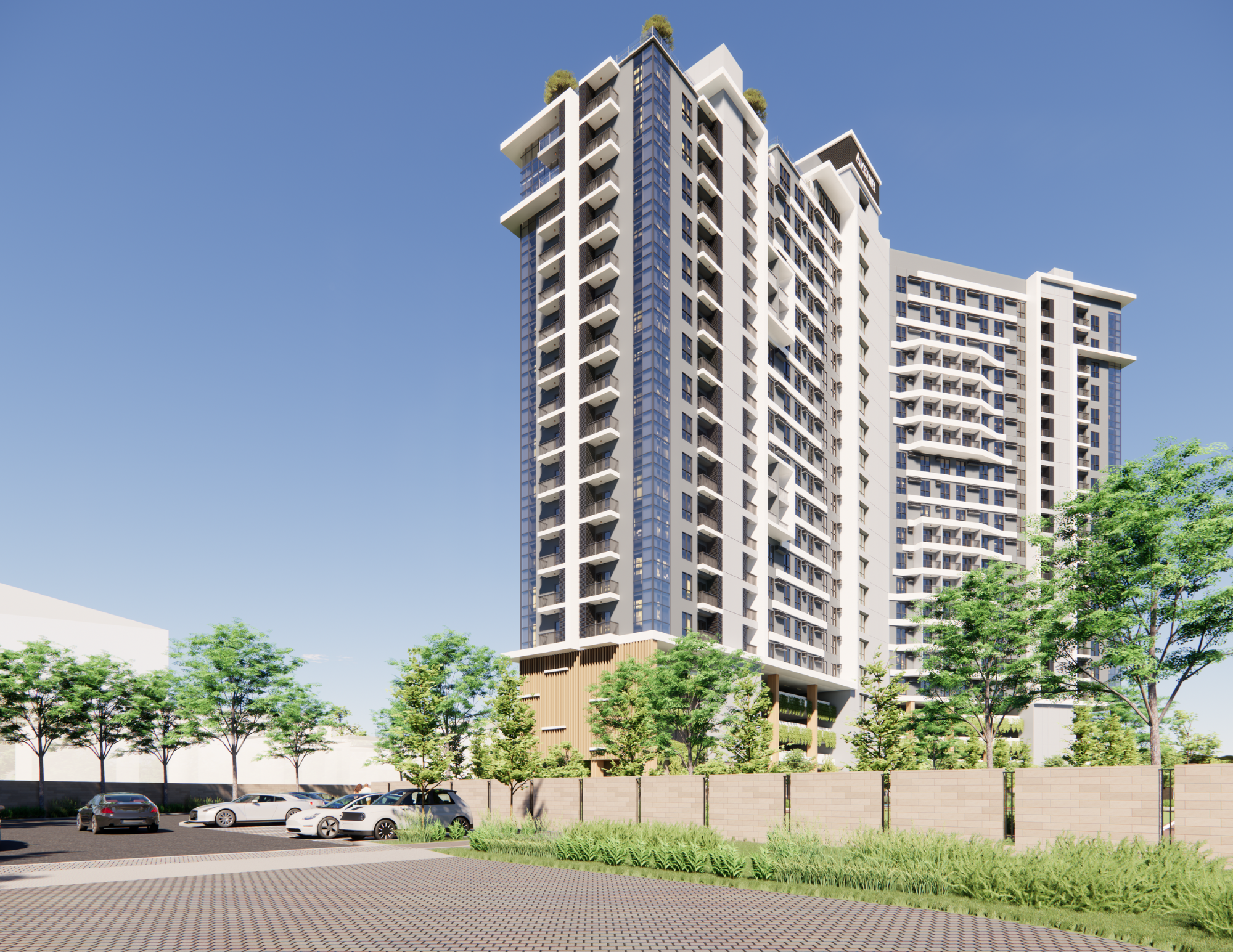 Modern high-rise apartment building with balconies, surrounded by trees and a parking lot, under a clear blue sky.