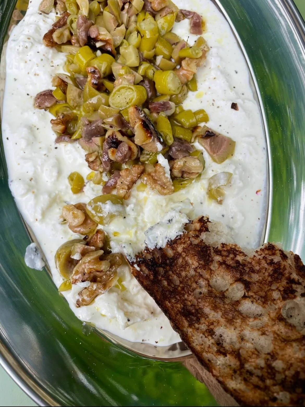 Gilda salsa on Marinated mozzarella 

When you don&rsquo;t want to buy a burrata, tear your ball of mozzarella and mix with some cr&egrave;me fraiche. I always mix with some lemon zest, salt and pepper, for an added zing. 

For the Gilda salsa 
I use