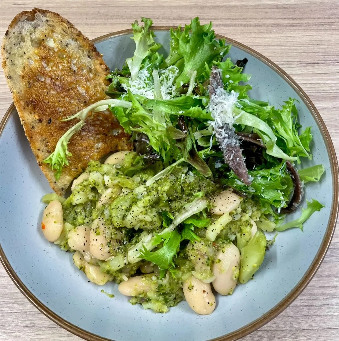 Broccoli and Anchovy Butter Beans with Chicken Schnitzel 

Separate your broccoli head and stalk and chop both into cubes. Bring a bit of water to boil, salt, and add your chopped broccoli stalks. After 3 mins or so, add your broccoli florets and coo
