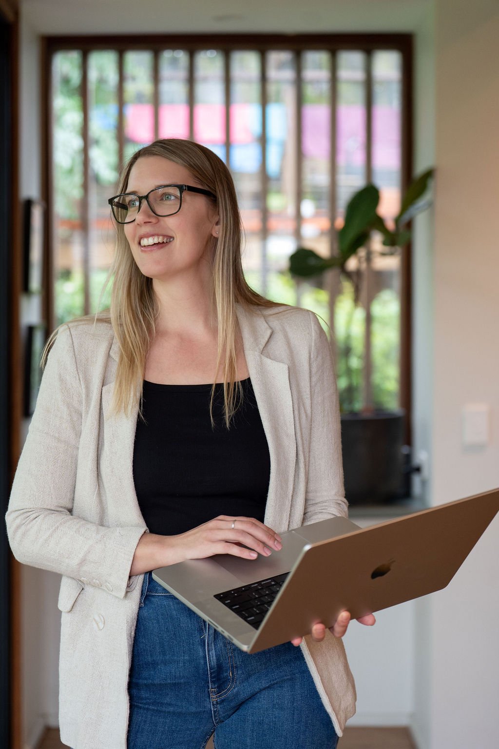 woman with laptop working on business