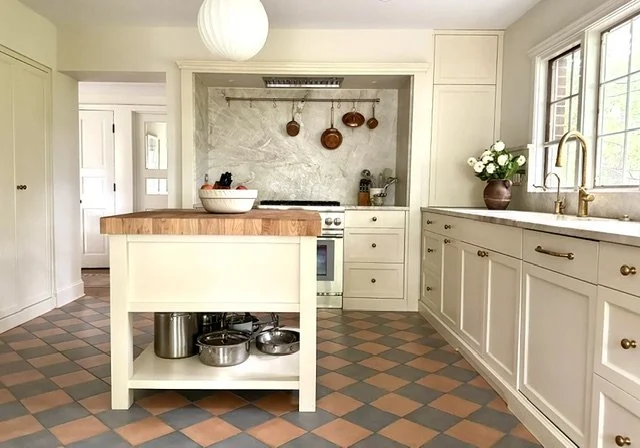 old world inspired kitchen with checkered floor