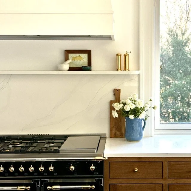 floating hood and stone shelf detail