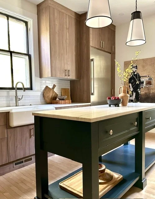 Wood cabinets and blue island kitchen