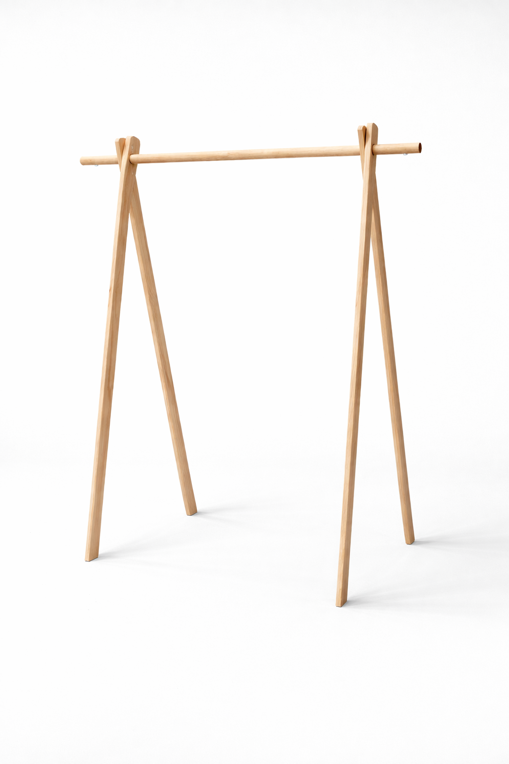 A minimalist wooden A-frame clothes rack with a horizontal bar for hanging garments, set against a plain white background.