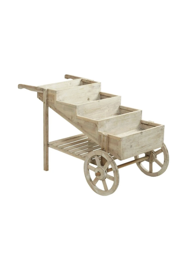 Unfinished wooden cart with two large wheels and a slatted shelf below, used for gardening or plant transport.