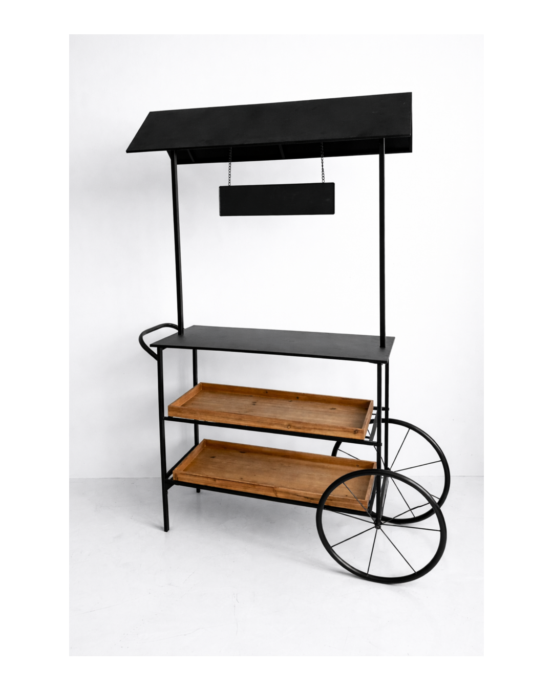 A black metal cart with wooden shelves, two large wheels on the right side, and a black canopy with a hanging sign.