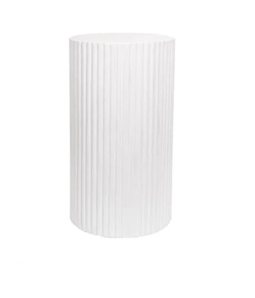 A tall, white cylindrical lamp with vertical ridges.