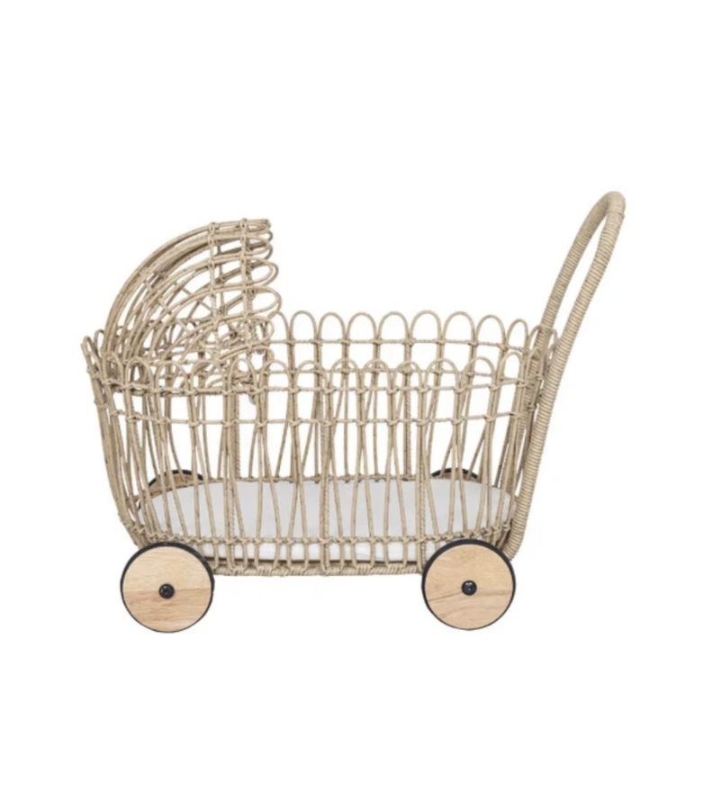 A wicker doll carriage with four wooden wheels