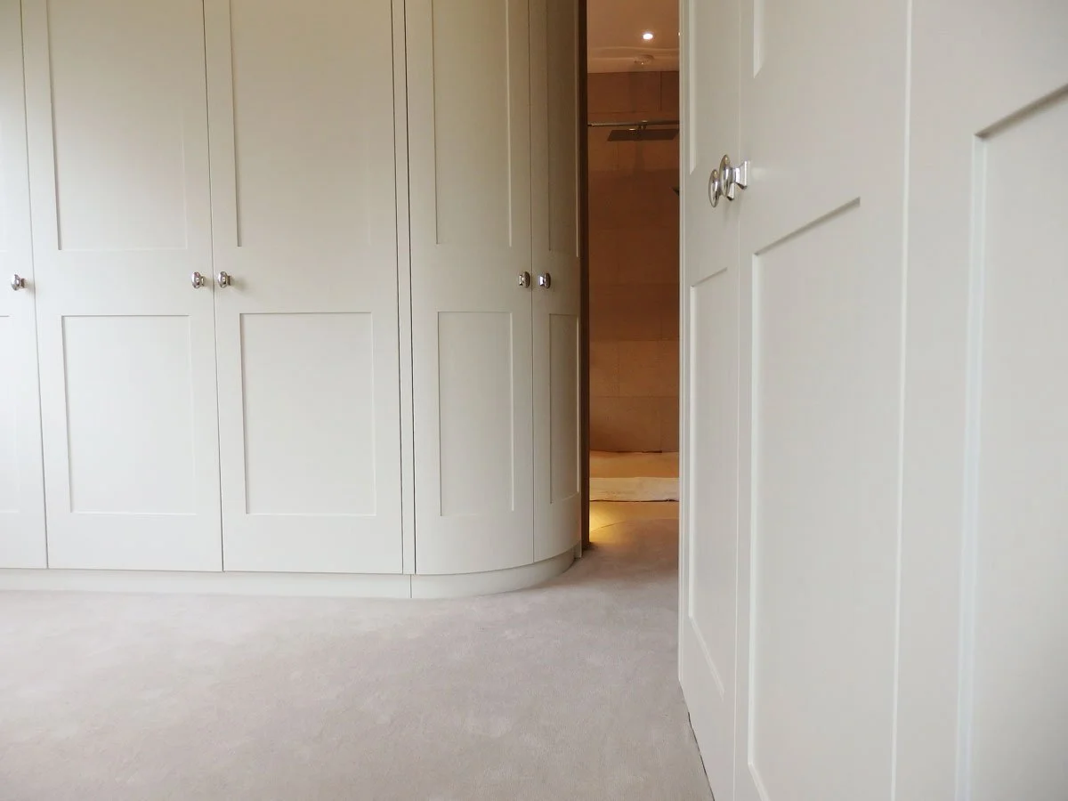 curved-white-wardrobes.jpg