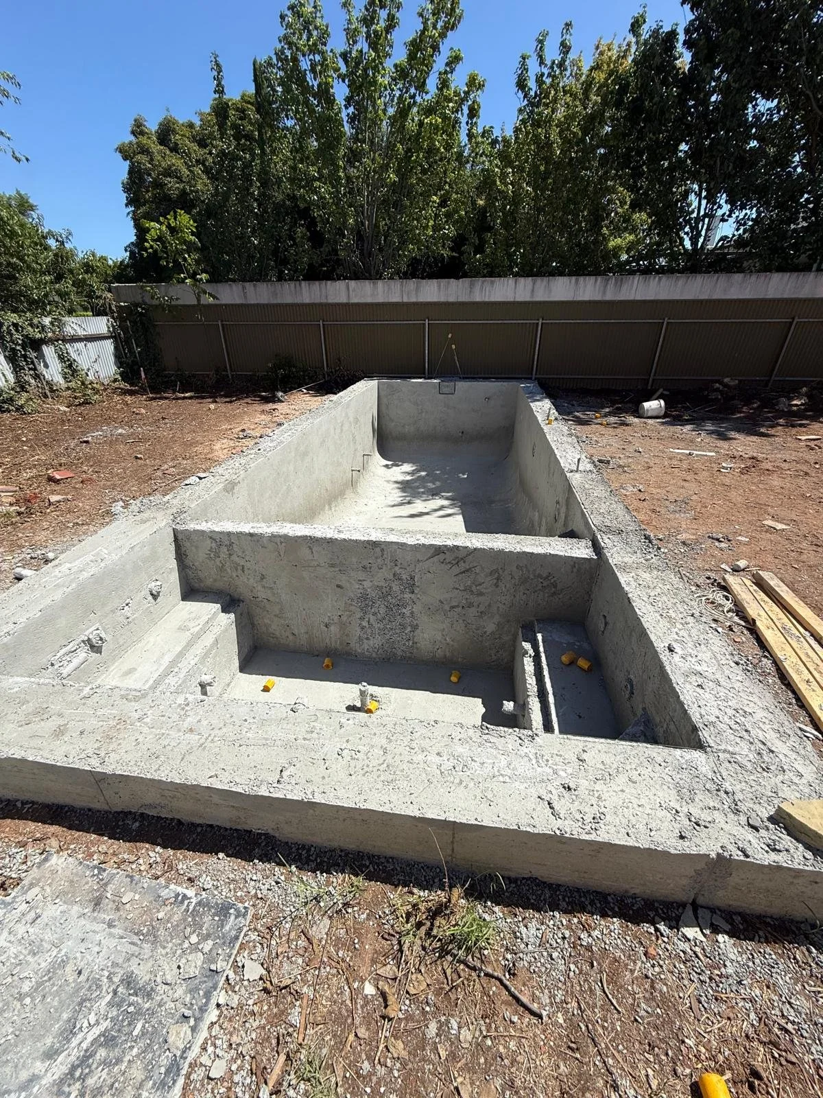 Image of completed foundation in backyard of Carter St