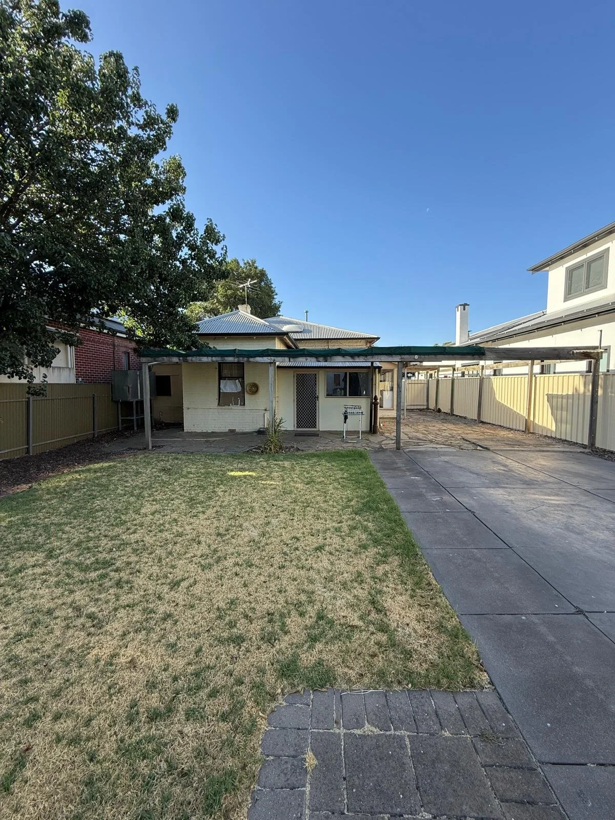 Image of the rear of the old house at Carter St