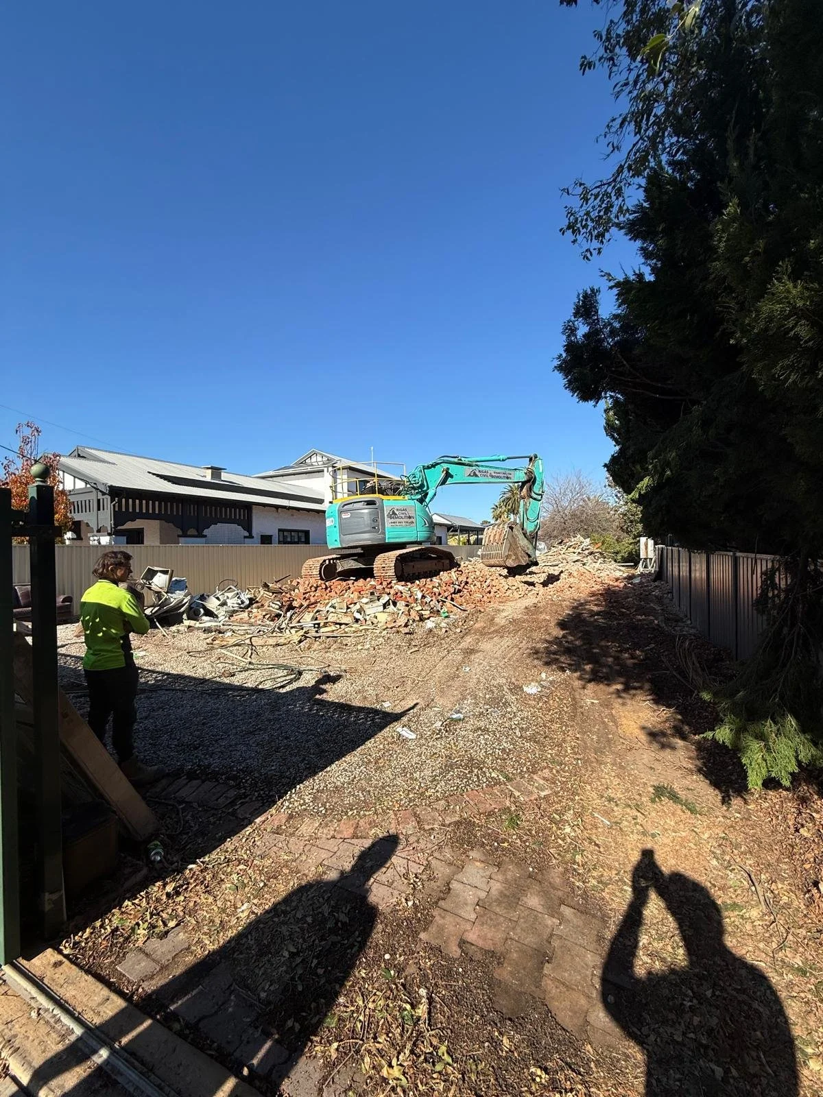 Image of ongoing demolition of old Carter St house
