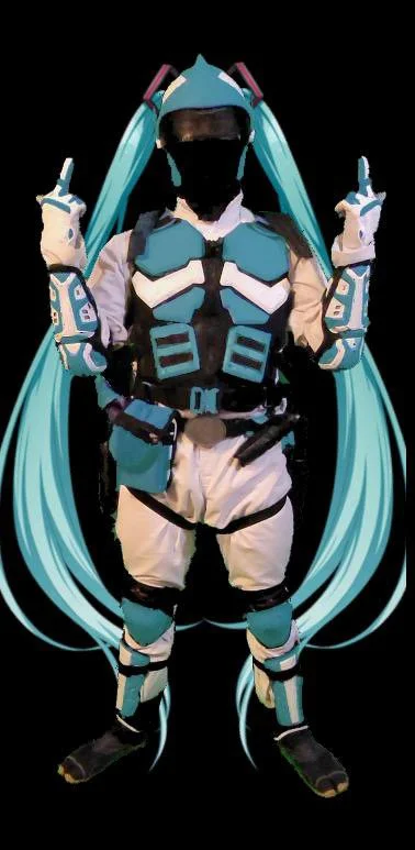 Person in a detailed futuristic costume resembling a sci-fi character with blue and white armor, long blue hair, and wearing a face mask, set against a black background.