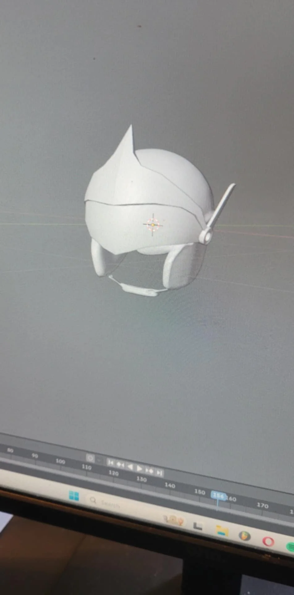 A 3D model of a simplified humanoid robot with a round head, no facial features, and two antennae, displayed on a computer screen in a 3D modeling software.