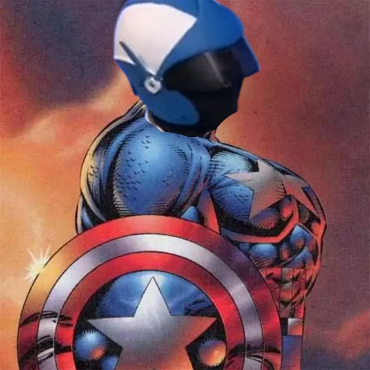 A digitally rendered superhero character resembling Captain America, wearing a blue helmet with a white star, a blue costume with red, white, and blue elements, and holding a round shield with a star emblem, against a background of an explosion and f