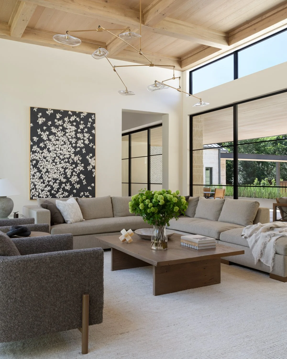 Modern living space in cream and greys with high wooden ceilings – High end residential design Fort Worth