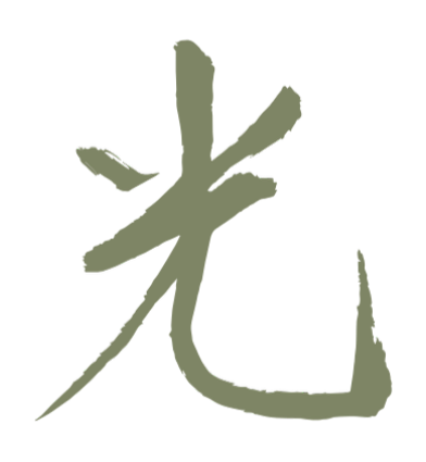 A stylised  light grey-green Japanese symbol that means “Hikari” and represents “Light” 