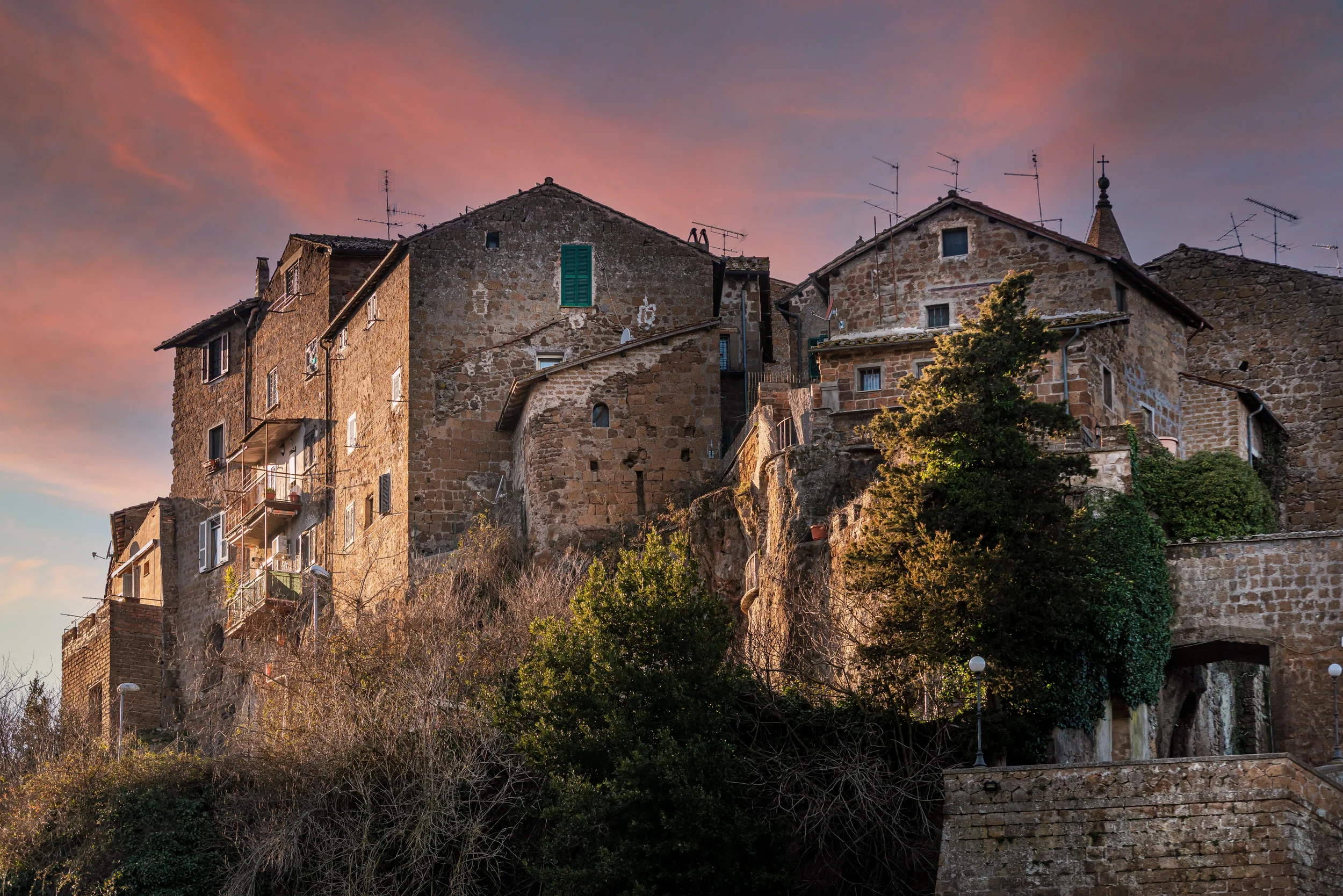 Calcata Vecchia perched on a rocky hill with medieval stone houses in the Treja Valley, Lazio, Italy