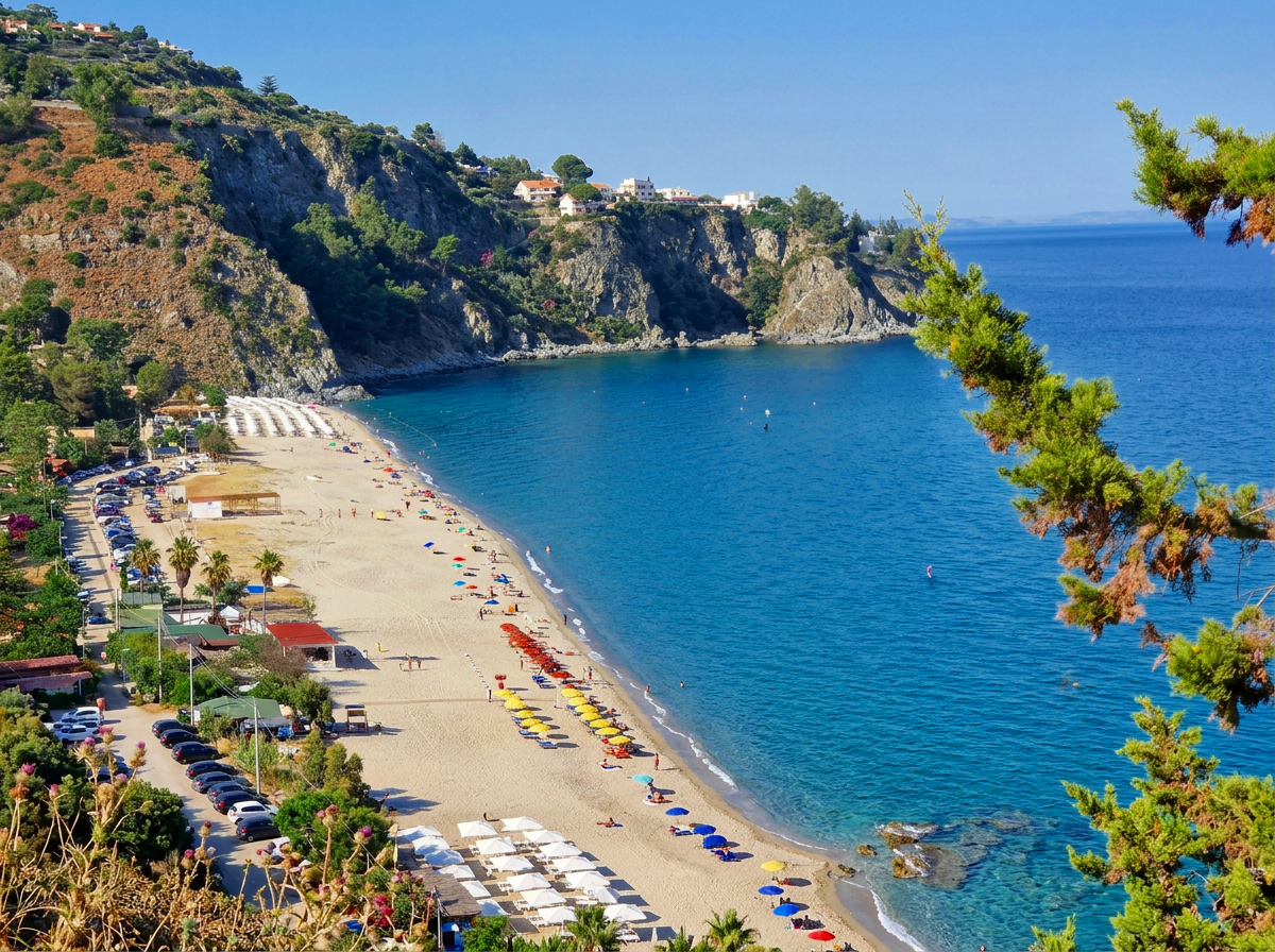 Caminia Beach with clear Ionian Sea water in Stalettì, Calabria, Italy