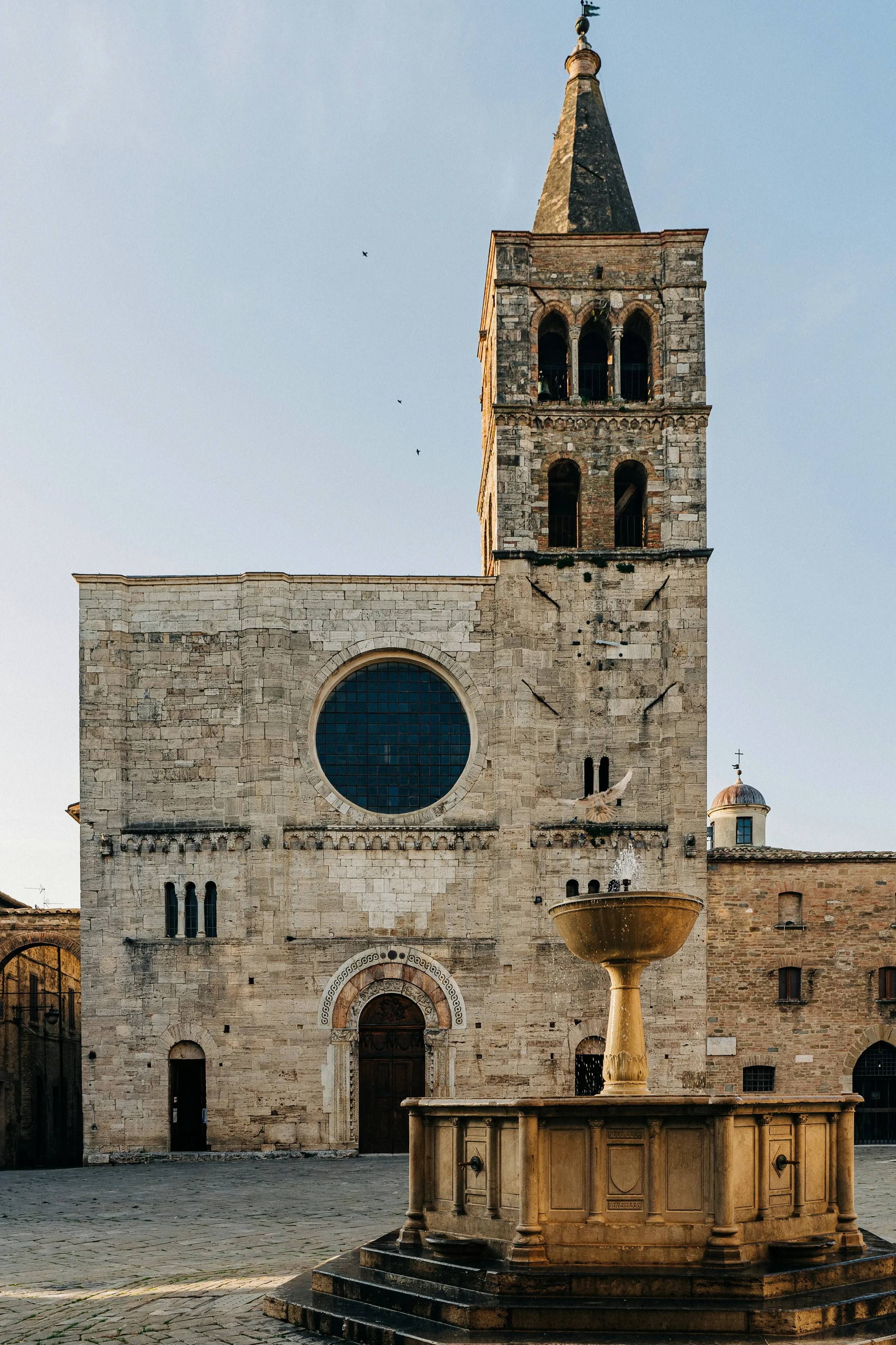 Church of San Michele Arcangelo and the fountain in Piazza Silvestri, Bevagna
