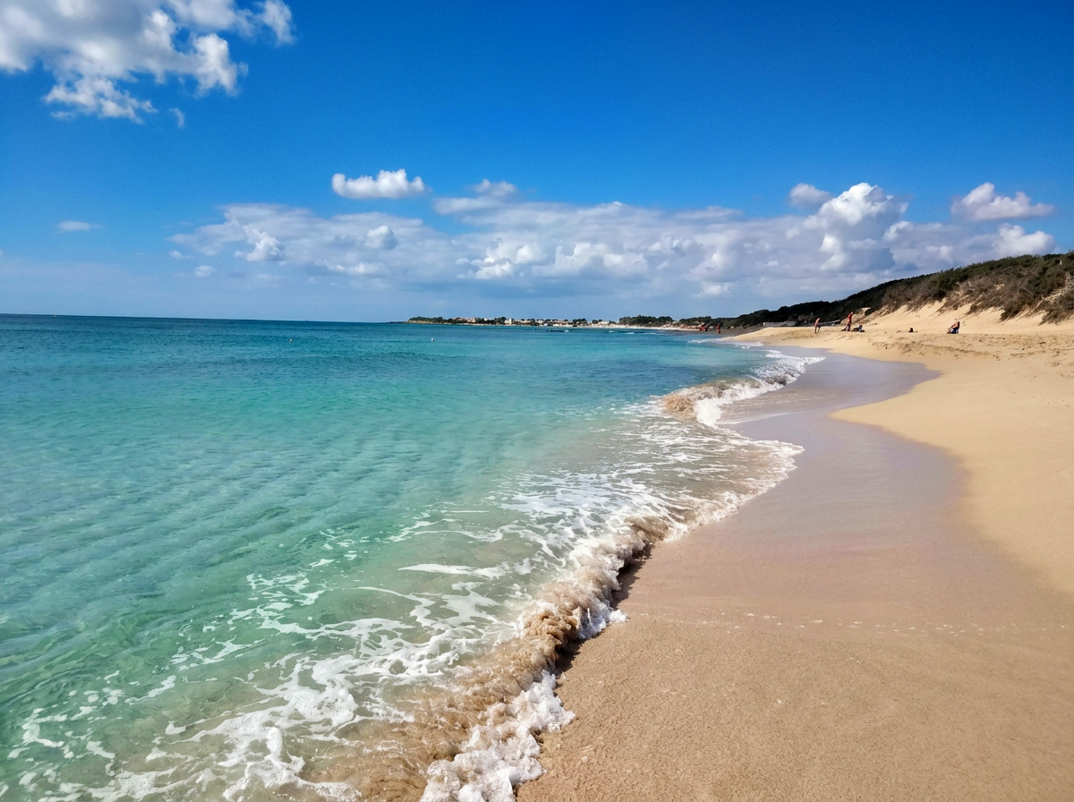 White sandy beach and turquoise water at Punta Prosciutto in Puglia, Italy