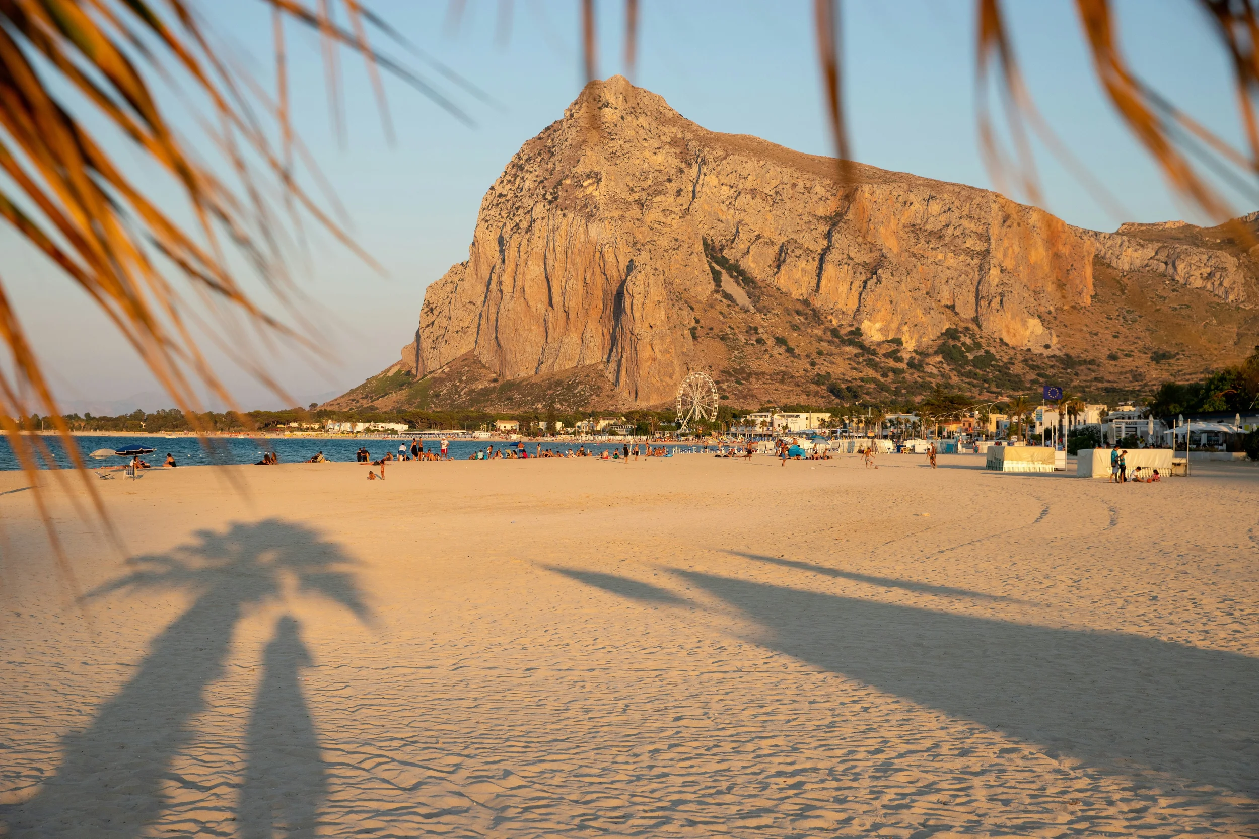 Sandy beach at San Vito Lo Capo with Monte Monaco in the background, Sicily, Italy.