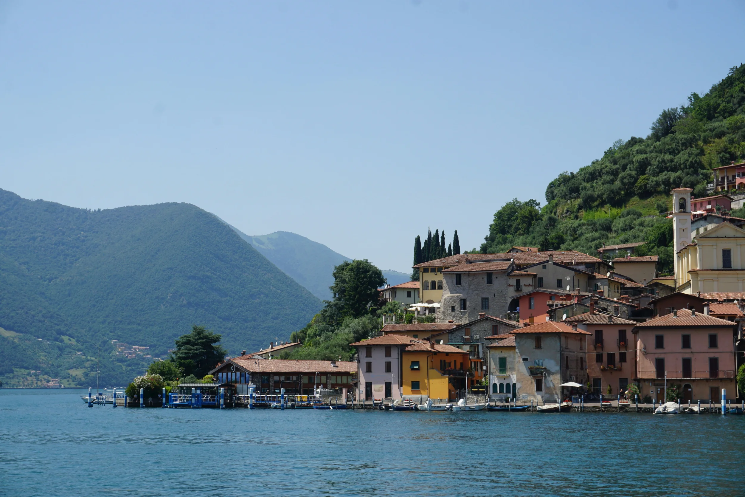 Lakeside houses and boats at Peschiera Maraglio on Monte Isola, Lake Iseo