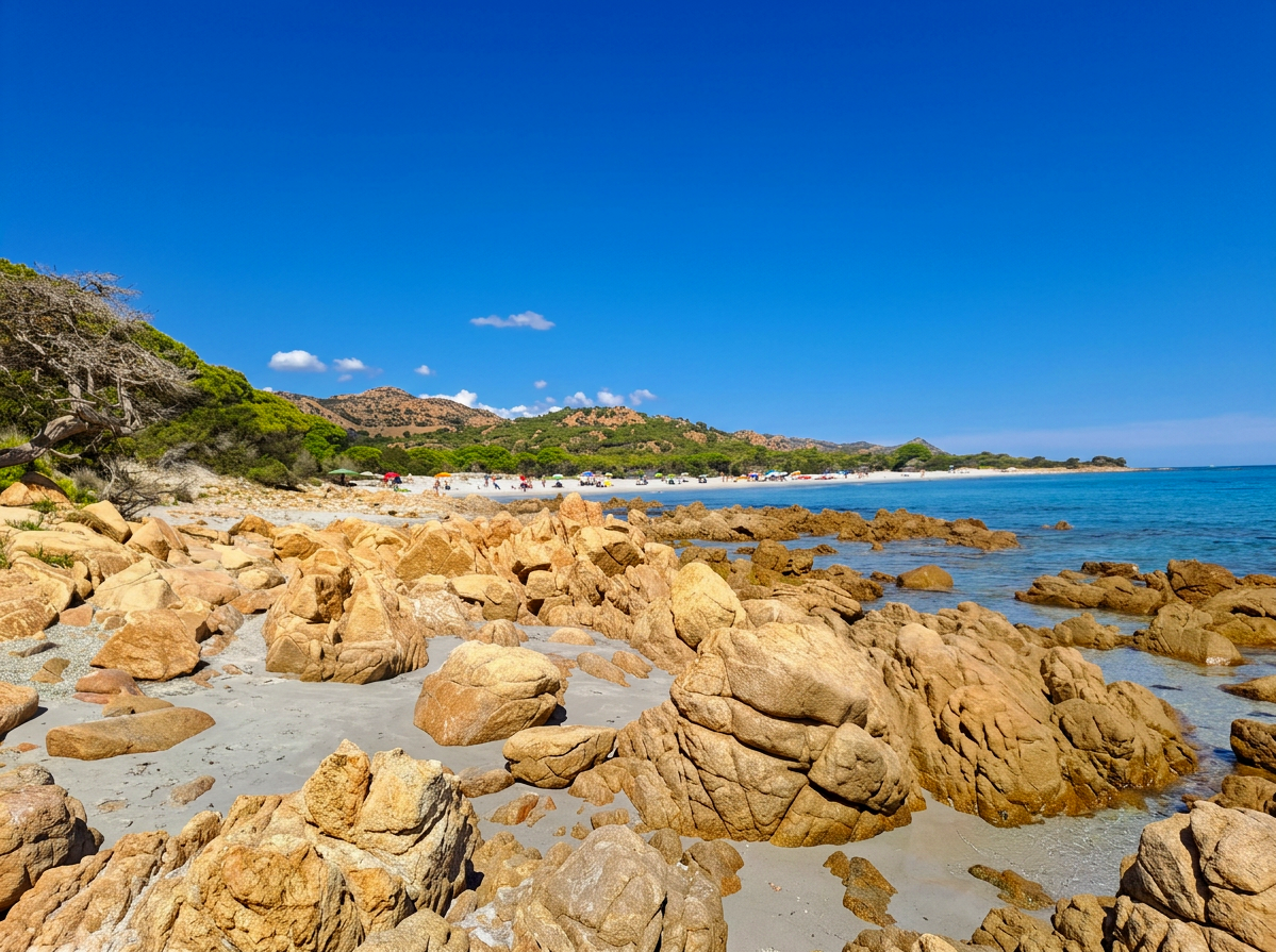 Aerial view of Bidderosa Beach in Sardinia, with golden rocks, turquoise water, Mediterranean vegetation and rugged hills