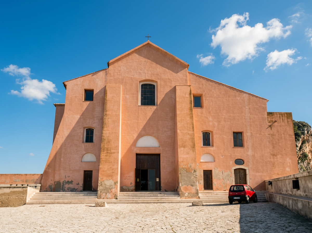 Warm terracotta facade of the Madonna del Granato sanctuary, with its stone forecourt and entrance steps.
