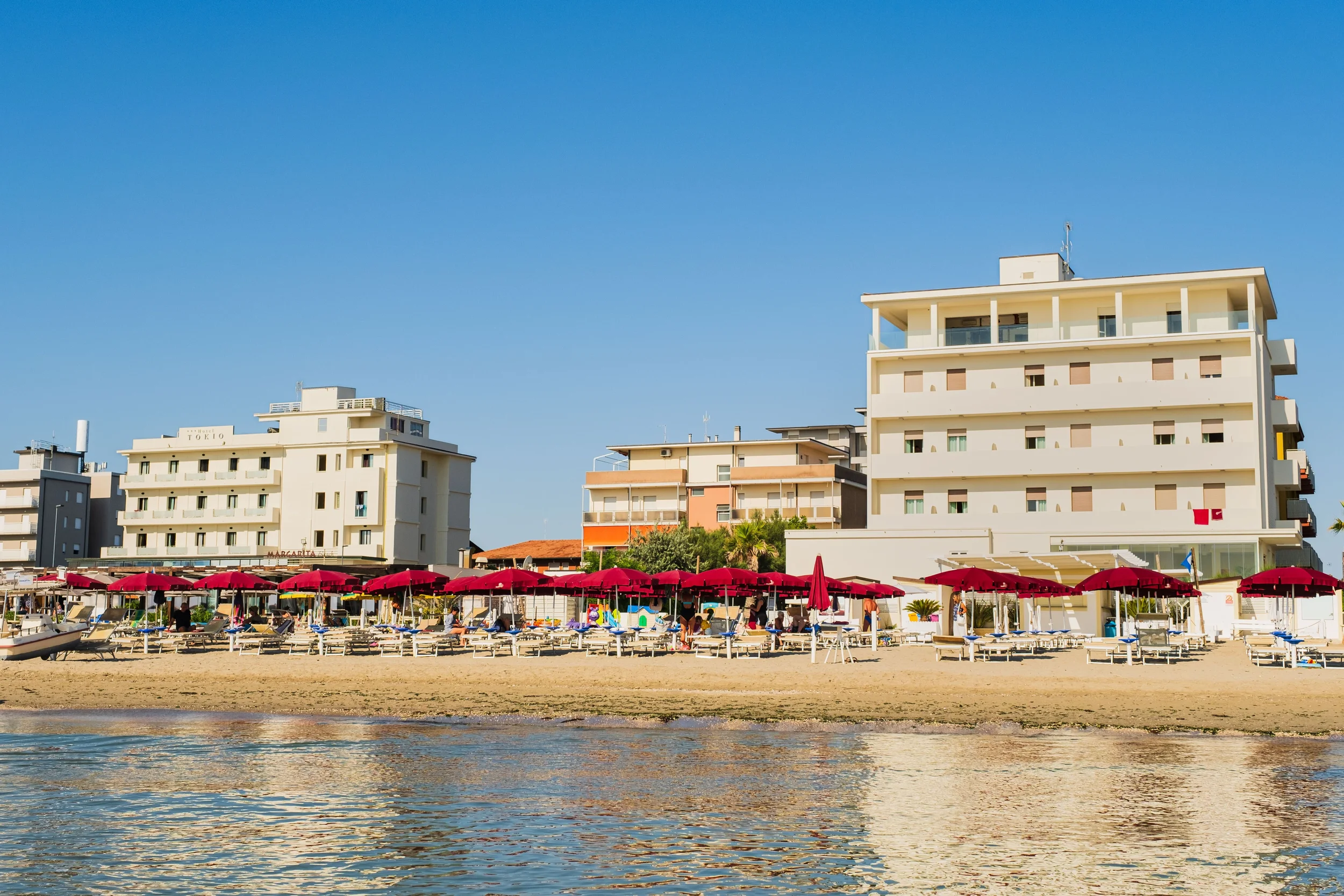 Beach clubs and colourful umbrellas along the Adriatic coast of Emilia-Romagna, Italy