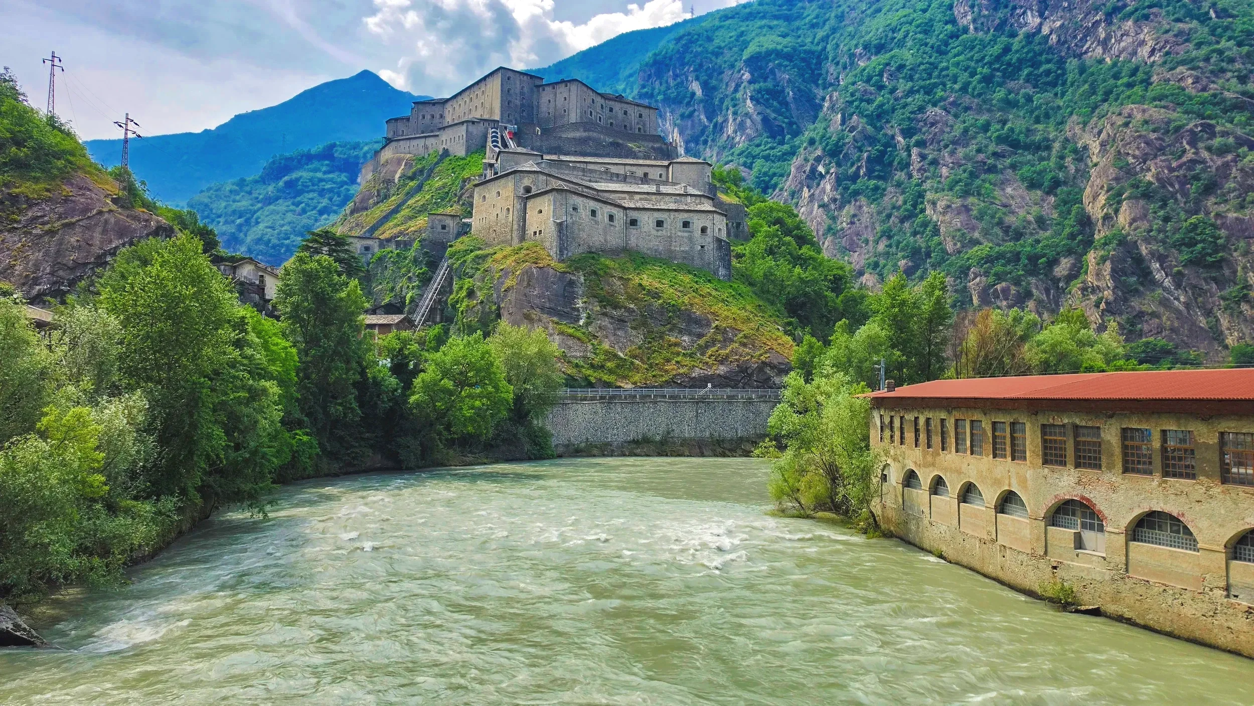 Forte di Bard rising above the medieval village of Bard in Valle d’Aosta, Italy