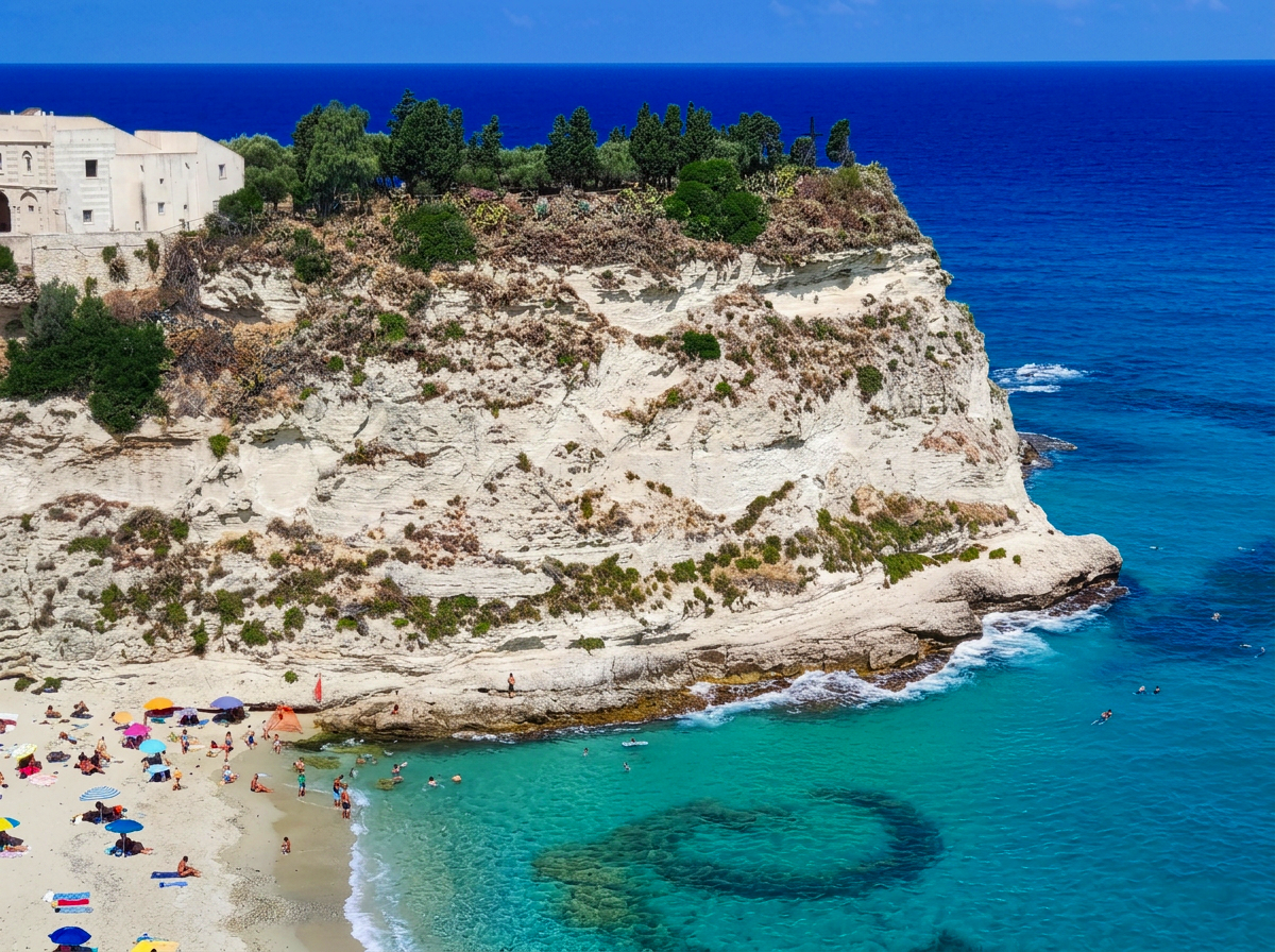 Marina dell’Isola beach beneath the cliffs of Tropea in Calabria, Italy