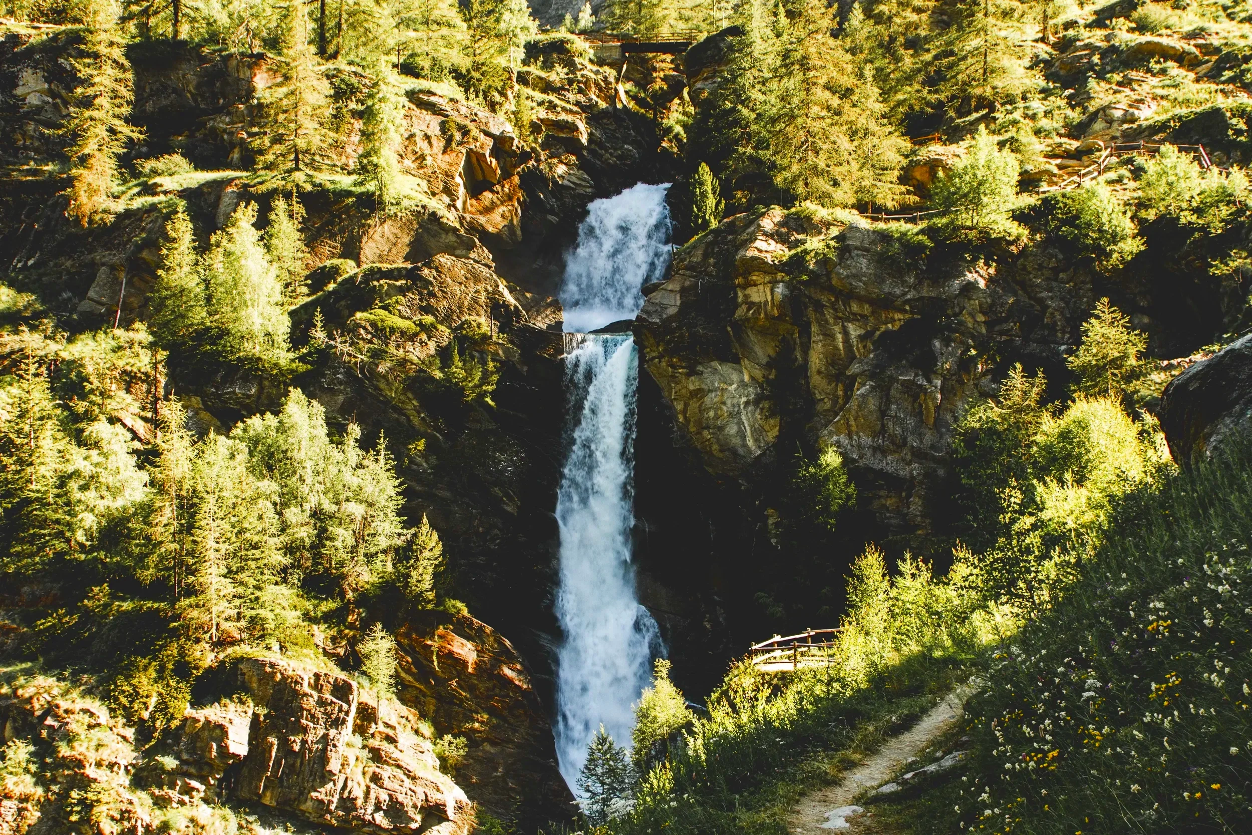 Lillaz Waterfalls cascading through the Alpine landscape near Cogne, Valle d’Aosta, Italy